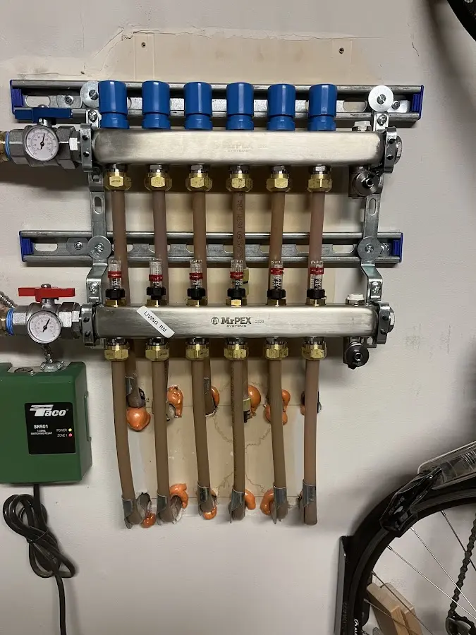 Plumber performing Sink Repair at a residential property in Overisel